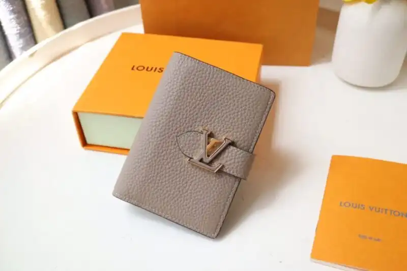 Elevate your style with the Louis Vuitton Vertical Compact Wallet in Beige. A perfect blend of elegance and practicality. 🌟💖✨ https://tinyurl.com/23gc2xrb