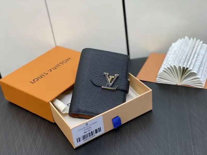 Discover elegance with the Louis Vuitton Vertical Compact Wallet in black. Perfectly crafted for your essentials, it adds a touch of luxury. ✨🖤 https://tinyurl.com/2yuo7mkv