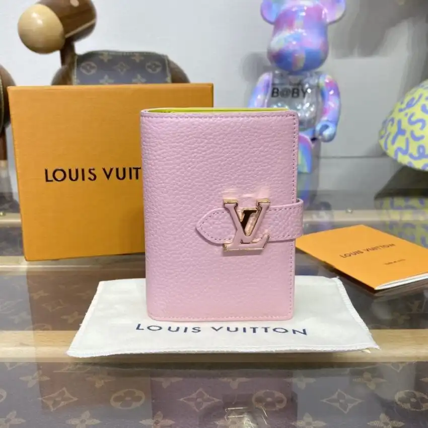 Discover elegance with the Louis Vuitton Vertical Compact Wallet in soft pink. Perfectly designed for your essentials. 💖✨🌸 https://tinyurl.com/273erdmh