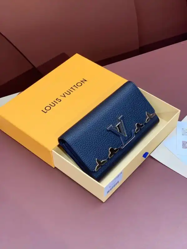 Discover the elegance of the Louis Vuitton Capucines Long in deep blue. A timeless accessory that complements your style beautifully. 💙✨👜 https://tinyurl.com/2co6xq6t
