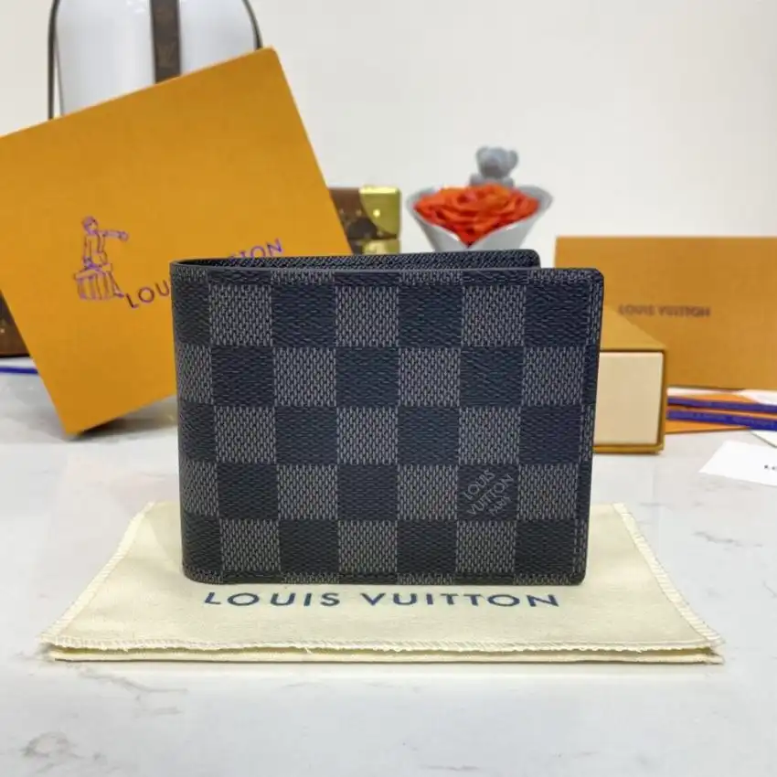 Discover the elegance of the Louis Vuitton Multiple Wallet in Black Grid. A perfect blend of style and functionality! ✨🖤🔑 https://tinyurl.com/22ta3v6m