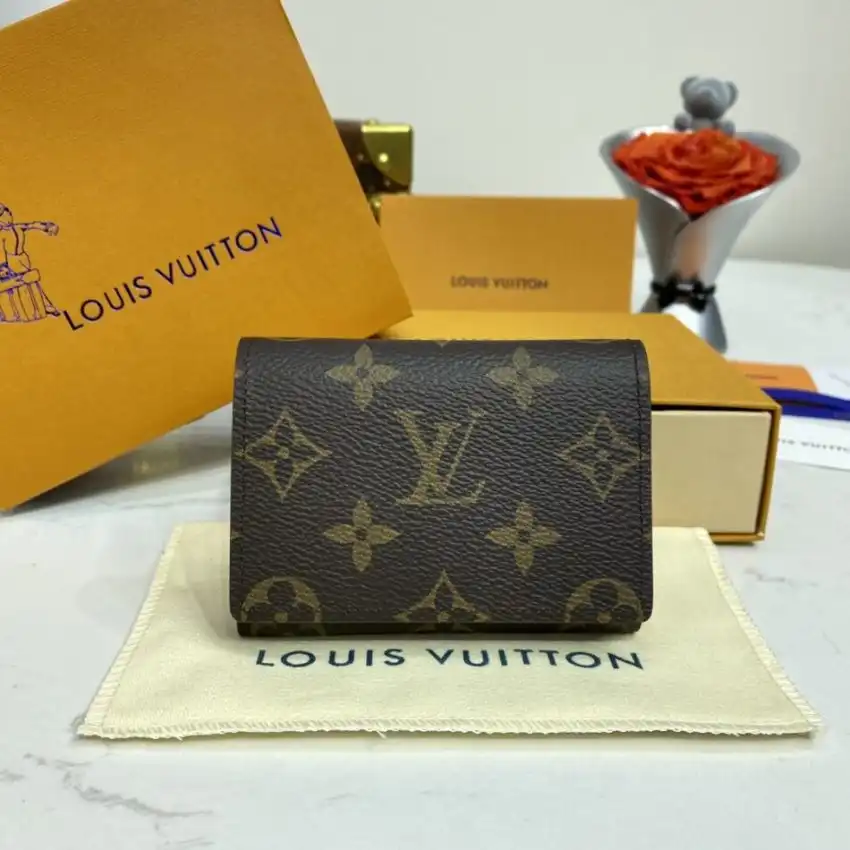 Discover the elegance of the Louis Vuitton Envelope Card Holder in brown. Perfectly crafted to hold your essentials with style! ✨💕🌟 https://tinyurl.com/22c3a4pf