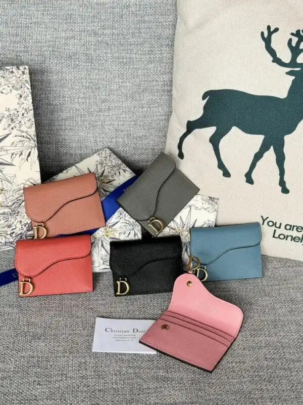 Introducing the Dior Saddle Flap Card Holder: a perfect blend of elegance and practicality, designed to hold your essentials with grace. ✨💕 https://tinyurl.com/27tce3nf