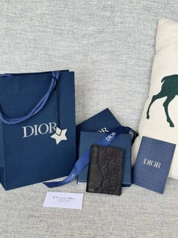 Elevate your style with the Dior Bi-Fold Card Holder in Oblique Black. A touch of elegance for your essentials! ✨🖤💼 https://tinyurl.com/2256xq2u