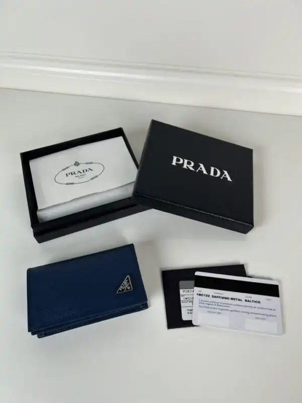 Discover elegance with the Prada Saffiano Wallet in soothing blue. A perfect blend of style and functionality for your everyday needs. 💙✨ https://tinyurl.com/2awcxdco