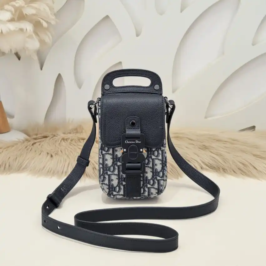 Discover elegance with the Dior Mobile Phone Saddle Bag. A perfect blend of style and functionality, designed to accompany you gently. 👜✨💕 https://tinyurl.com/2cx6py6l