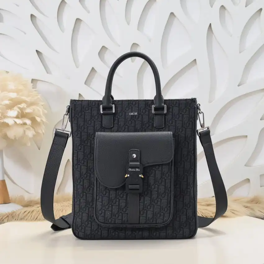 Discover the elegance of the Dior Saddle Shopping Tote in Oblique Black. A perfect blend of style and sophistication. 👜✨💖 https://tinyurl.com/2dmctydd