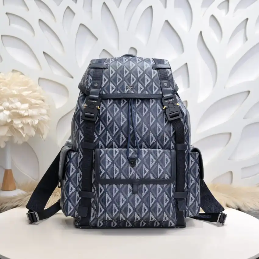 Discover elegance on the go with the DIOR Hit The Road Backpack. 💙✨ Perfect for your adventures, wrapped in luxury and style! 🎒🌟 https://tinyurl.com/23oyp2lr