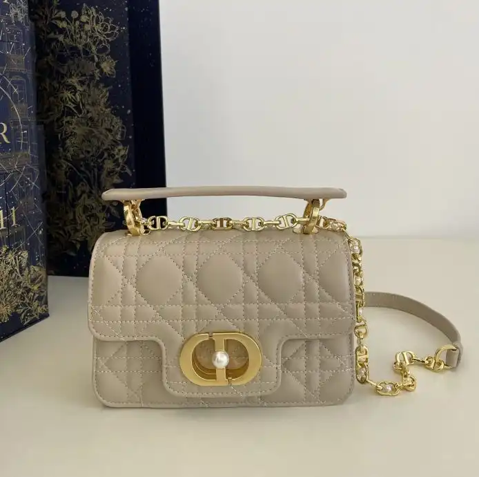 Discover elegance with the Dior Jolie Top Handle in beige. A perfect blend of style and grace for your delicate moments. 🌸✨👜 https://tinyurl.com/24xfdfpv