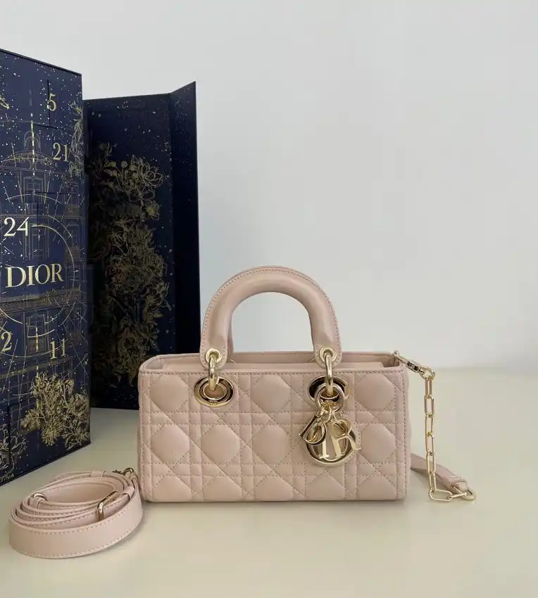 Discover the elegance of the Dior Lady D-Joy Bag in soft pink. A perfect blend of sophistication and charm. 💖✨👜 https://tinyurl.com/25em9jld