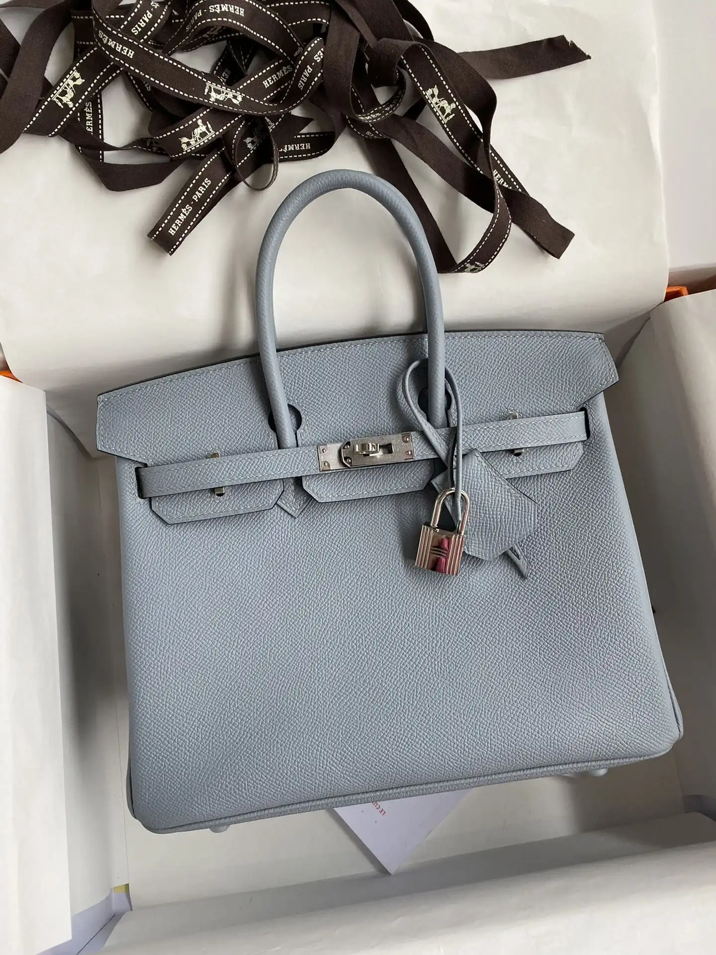 Discover the elegance of the Hermes Birkin in Epsom Linen Blue with Silver accents. A timeless piece for your collection! 💙✨👜 https://tinyurl.com/29joqsm7