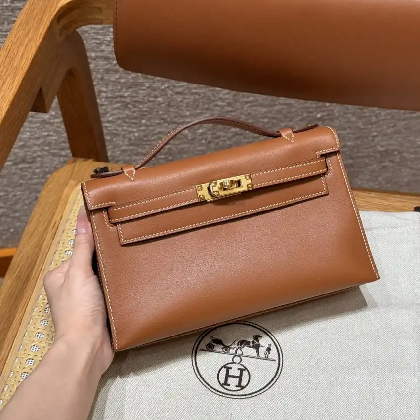 Discover the elegance of the Hermes Kelly Pochette in lovely Swift Brown. A timeless companion for your cherished moments. ✨💖👜 https://tinyurl.com/2cu99ssj
