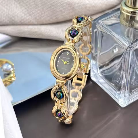 Ladies’ silky texture Oval alloy case set with movable fine bead bracelet Sun Print rhinestone dial Elegant Lady quartz watch https://tinyurl.com/23vkxtqa