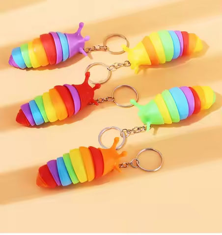 1pc Mini Slug Fidget Toy with Keychain,Cute Caterpillar Shape Stress Reliever Office Desk Toy Sensory Toy for Kids and Adults https://tinyurl.com/25e9hou4