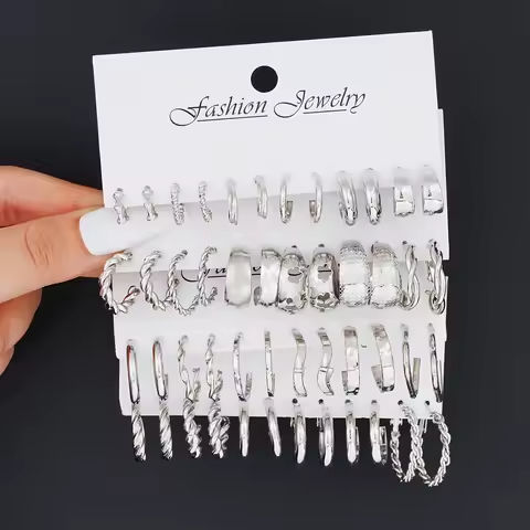 Fashion Silver Color Twisted Small Hoop Earrings Set Metal Hollow Earring For Women C-Shape Ear Studs Trendy Jewelry https://tinyurl.com/28fbj8ph